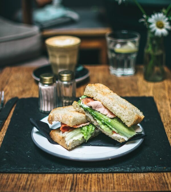 ham sandwich on white ceramic plate