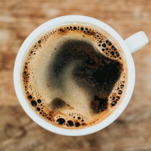 white ceramic mug filled with coffee